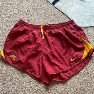 Nike Red and Yellow Athletic Shorts with Curved Side Panels